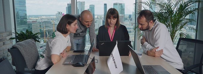 Focused product team holding a brainstorming session in a modern workspace