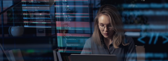 Data scientist building and testing algorithms with code overlays on screen