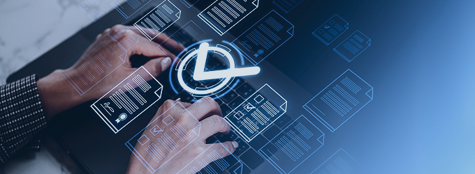 IT professional working on laptop surrounded by holographic document schemas and a scheduling icon for task management