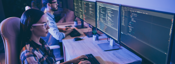 Software team tackling a sprint with side-by-side programming and real-time debugging
