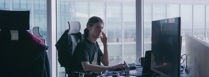 DevOps engineers and client conducting a cloud deployment planning session