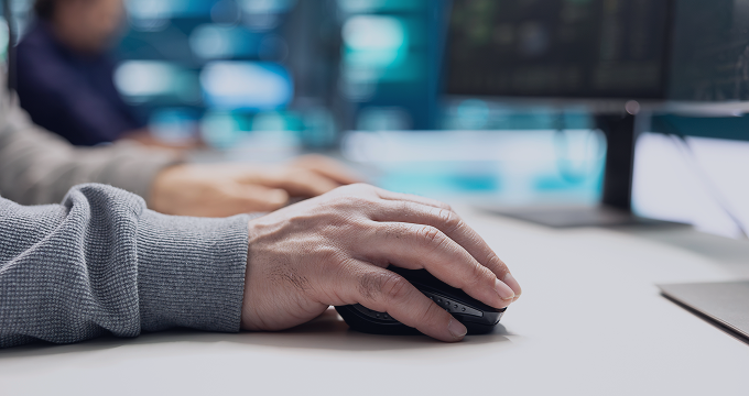 IT team member uses unified console to deploy updates and monitor system health across servers