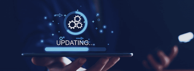 IT operations team tracks software patch rollout in real time via a mobile device interface.