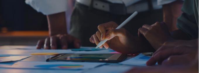 IT team brainstorming solutions together in a collaborative workspace