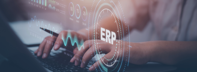 ERP implementation team enters master data into a central system for real-time business insights.