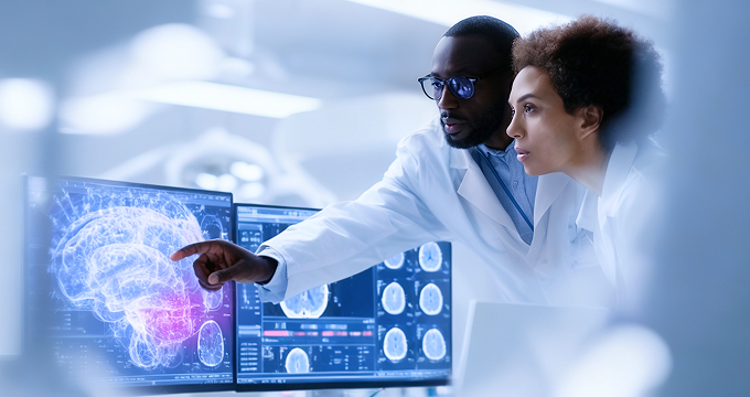 Healthcare professionals reviewing neurological MRI results on a multi-screen setup