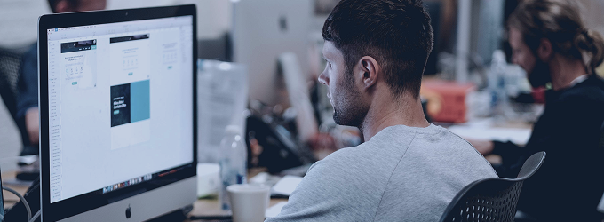 UI designer fine-tunes high-fidelity mockups to align with product branding.