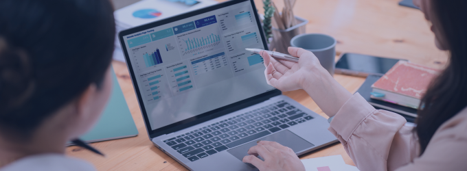 Reviewing quarterly sales data with interactive spreadsheets for performance evaluation.