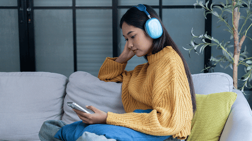 On-demand music streaming app interface with search, playback, and track recommendations.