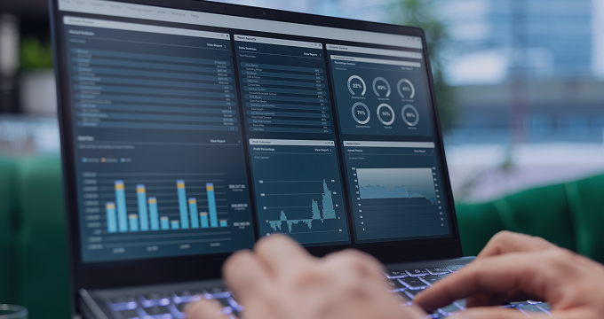 A professional using an analytics platform to track performance and business metrics.