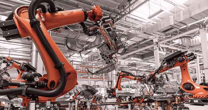 Automated assembly line uses AI-driven robotics for agile, data-powered production and quality control.